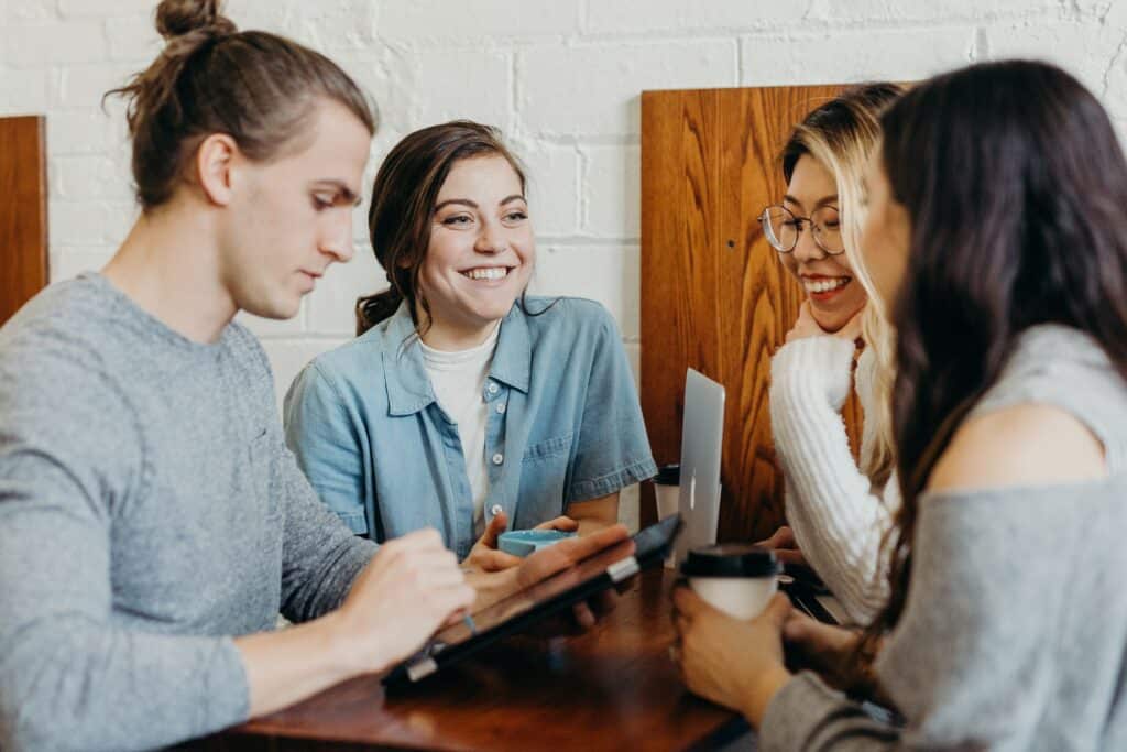 A group of employees working collaboratively at an office.